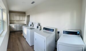 Laundry Room with washers and dryers