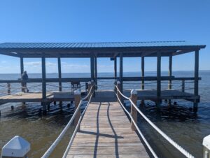 dock at Fort Morgan on bay